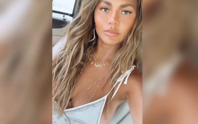 Chrissy Teigen Poses in Only Black Leggings Showing the Result of Her Breast Reduction